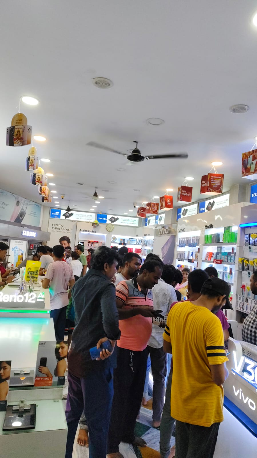 Long display counter aisle at The Arati Electronics